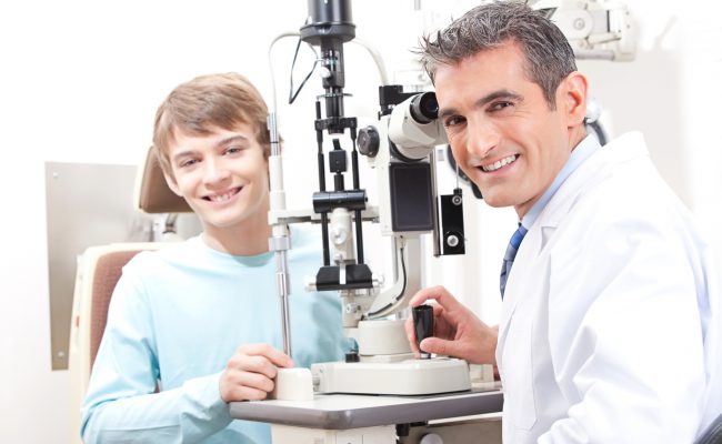 Optometrist And Pateint In Clinic